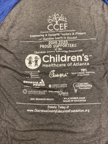 Back of t-shirt with sponsors displayed